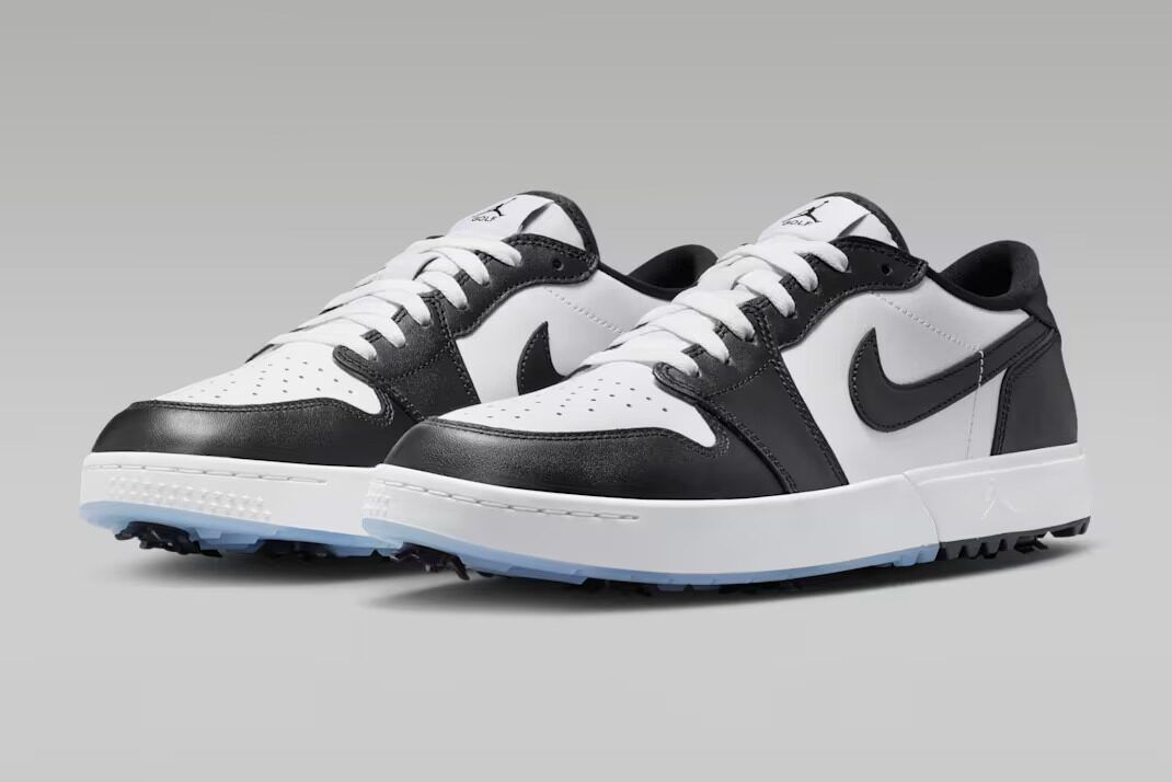 Air Jordan 1 Low Golf Spiked Concord in purple and white, featuring golf spike outsole and low-cut silhouette