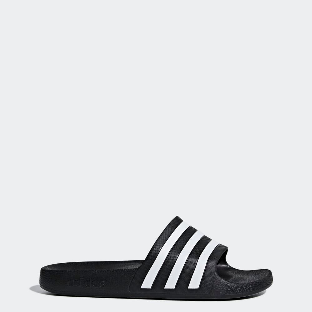 adidas Adilette Aqua Slides in neutral colorway, side profile showing molded footbed and toe strap