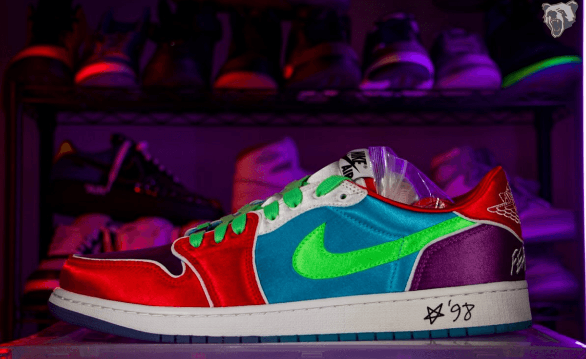 Jayson Tatum's exclusive Air Jordan 1 Low PE in multi-color satin with red toe, black vamp, light blue panels, and purple heel