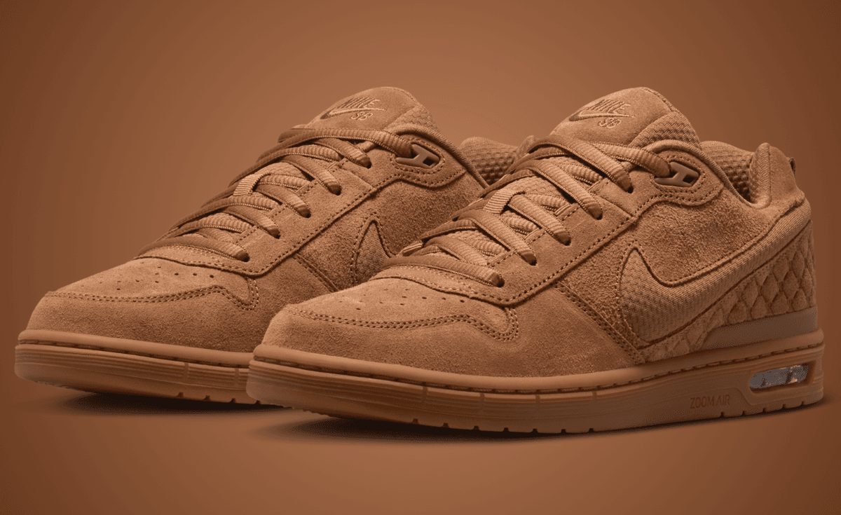 Nike SB Paul Rodriguez Zoom Air Low in Light British Tan wheat colorway, side profile view showing suede upper and mesh Swoosh details