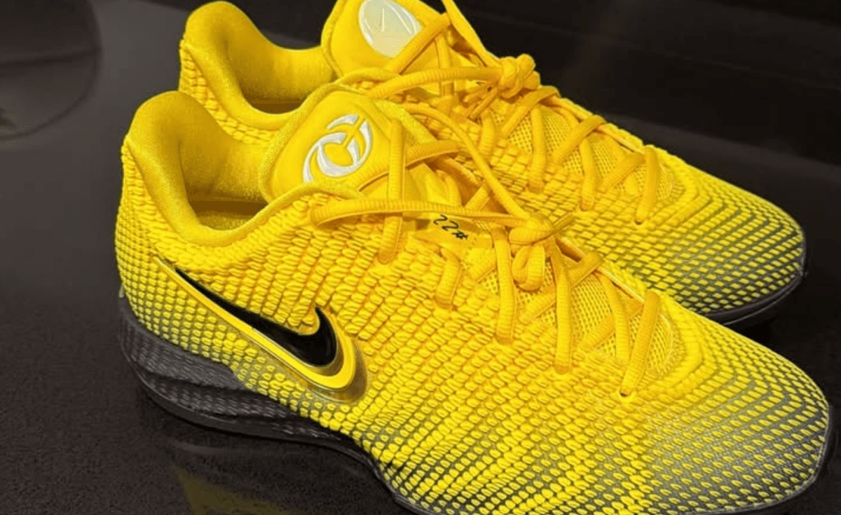 Nike Caitlin 1 Yellow PE showing two-tone Iowa-inspired colorway and new location pin tongue logo