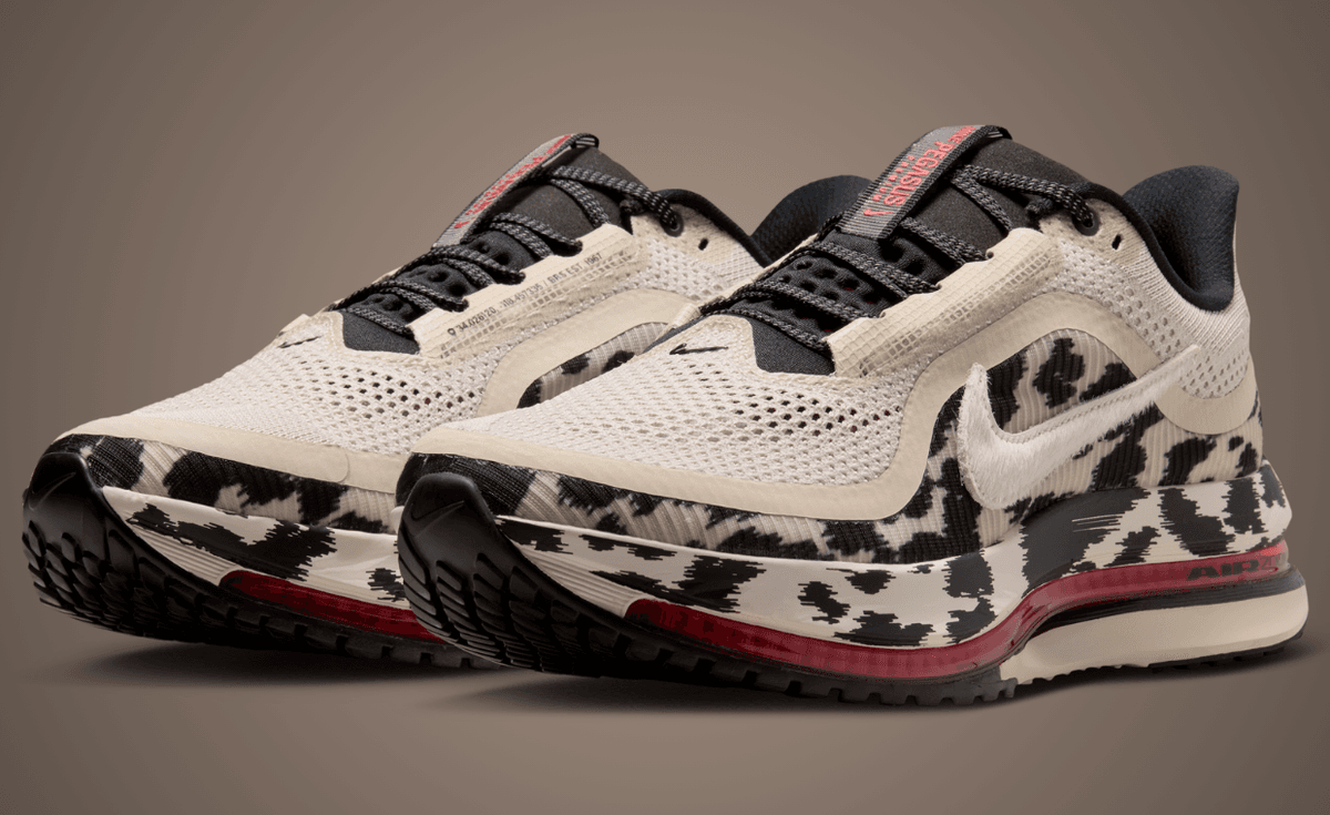 Nike Pegasus Premium women's shoe in white with black cow print spots