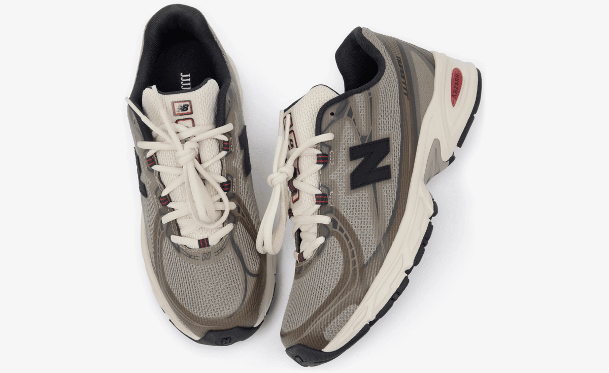 JJJJound x New Balance 740N in tan, taupe, and beige earth tones with off-white mesh tongue and navy accents