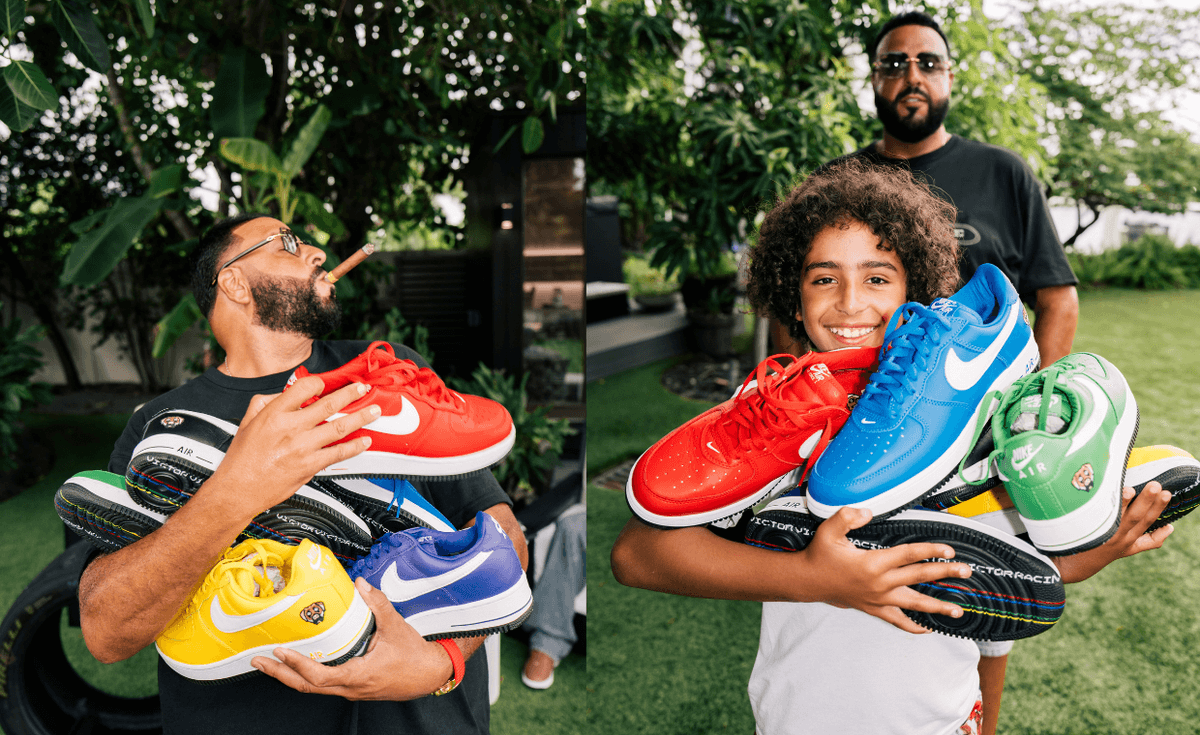 DJ Khaled holding multiple colorways of the Victor Victor x Nike Air Force 1 Low '01 collection in red, yellow, black, purple, and blue
