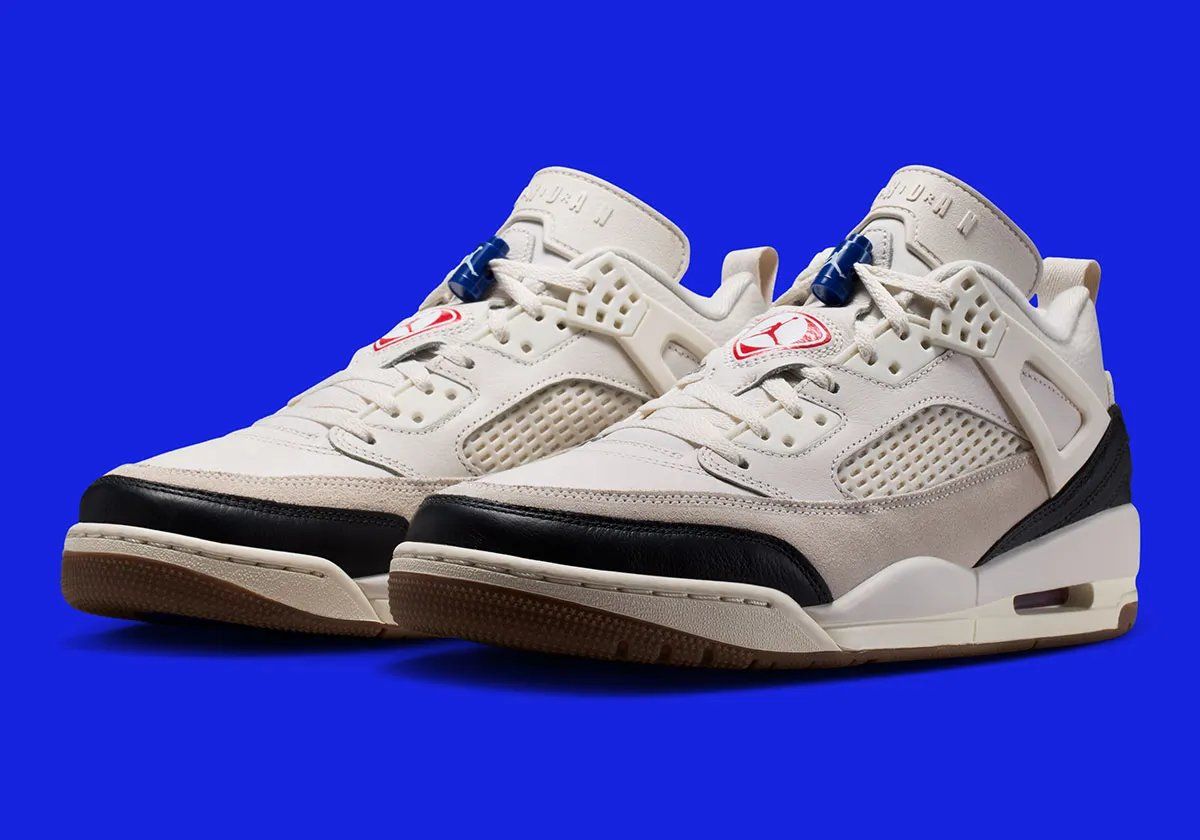 Jordan Spiz'ike Low FC in University Red and Sail with Nike Football logo on tongue and gum brown outsole