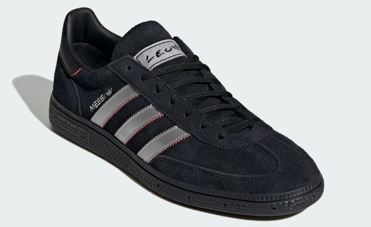 adidas Handball Spezial in black and silver from the Leo Messi collaboration, showcasing the iconic court silhouette's minimalist colorway execution