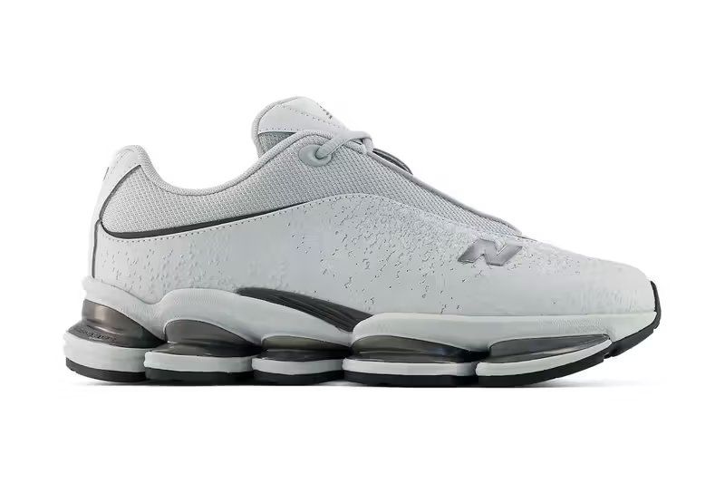 New Balance 2000S in Grey and Black colorway, side profile view showcasing retro running silhouette with modern design updates
