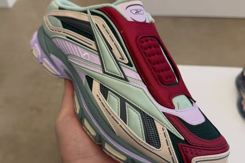 Reebok Premier Ultra Mule in pastel green, lilac-pink, and red colorway, showcasing chunky midsole and open-back slip-on silhouette