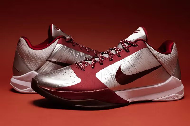 Nike Kobe 5 Protro Lower Merion Aces Away in metallic silver and team red, side view