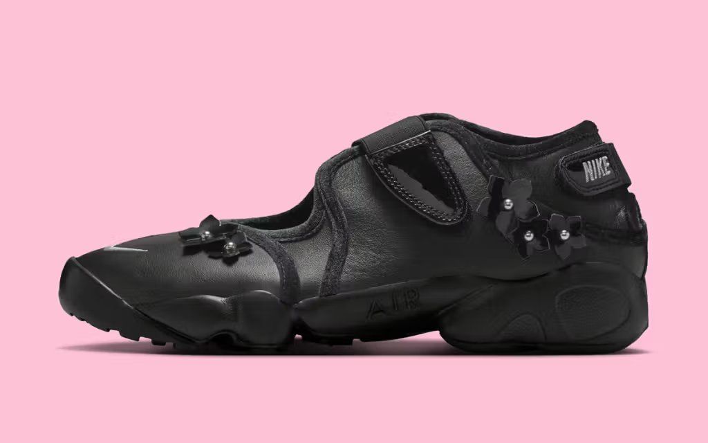 Nike Air Rift in dark floral colorway, showing the signature split-toe profile with botanical patterning across the upper