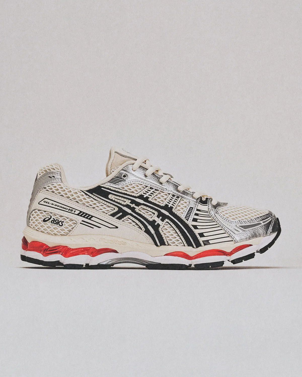 Lapstone & Hammer x ASICS GEL-Kayano 12.1 'The Spark' with diamond knit mesh upper, metallic silver and cream leather panels, and red midsole accents