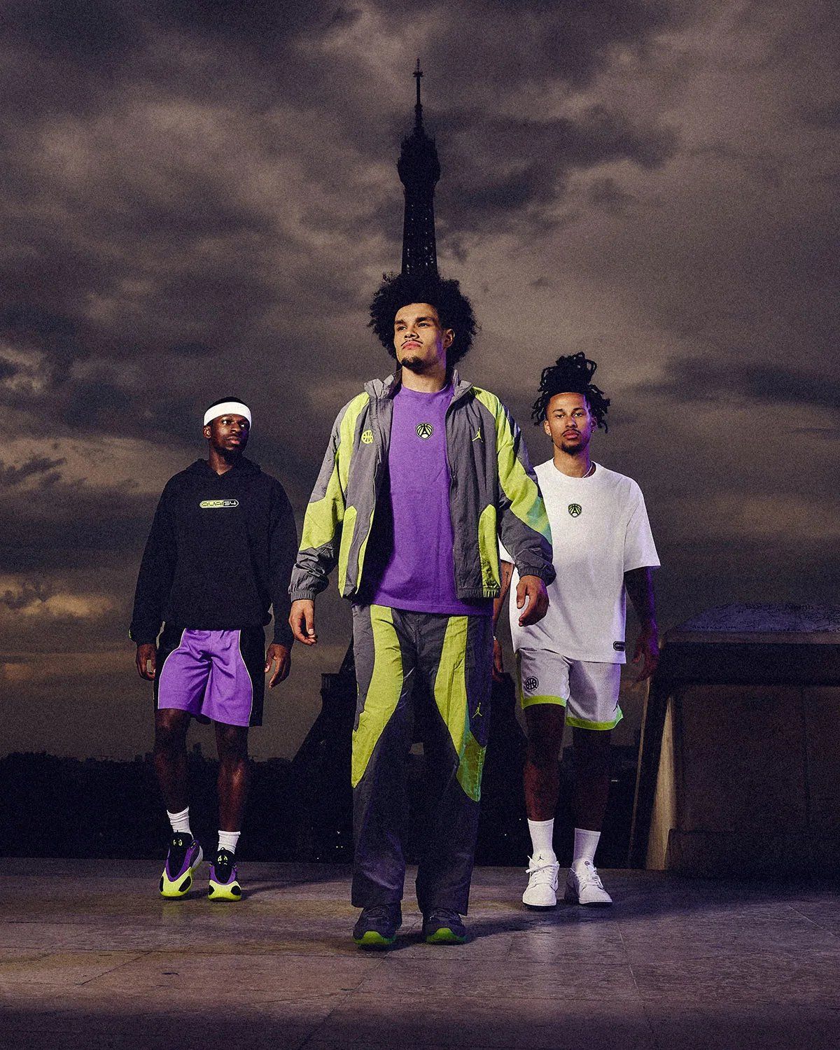 Jordan Brand Quai 54 2026 collection featuring Air Jordan 11 IE Low in dark grey nubuck with green accents