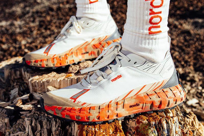 Norda SS26 Kaleidoscopic collection featuring cosmic gradient and camo colorway silhouettes