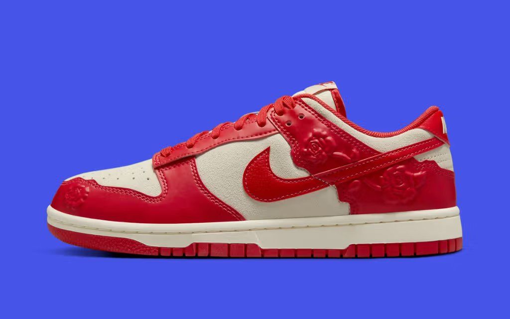 Nike Dunk Low in ruby red with embossed rose detailing on the upper