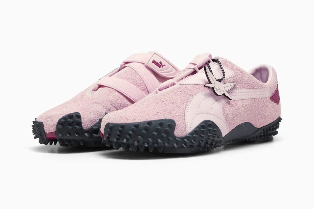 PUMA Mostro Espeon collaboration sneaker in purple and gold colorway