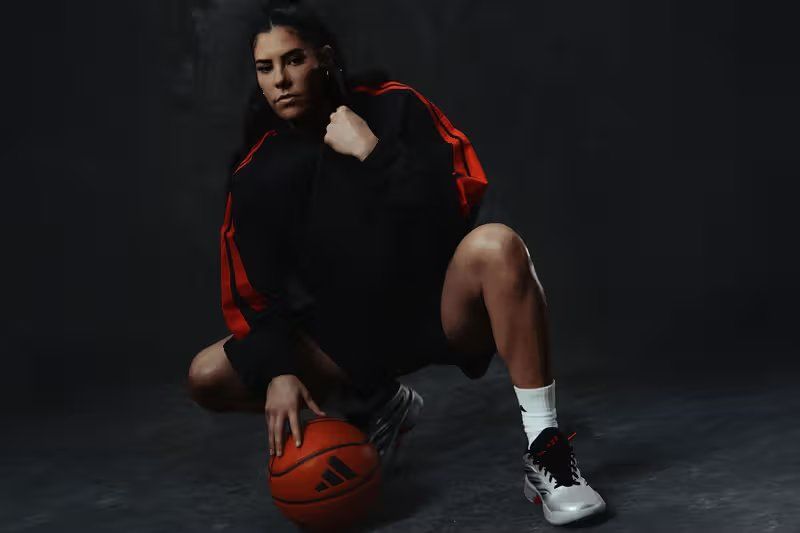 Kelsey Plum in Adidas Basketball gear during official campaign announcement