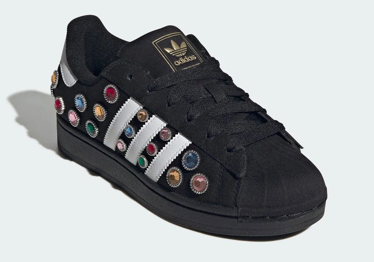 adidas Superstar "Jewel" with multicolored gemstone inlays and silver metallic trim on black canvas upper