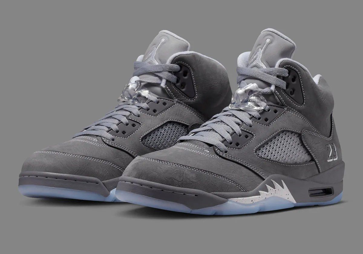 Air Jordan 5 Wolf Grey colorway, full side profile view showing shark-tooth midsole and lace-lock system