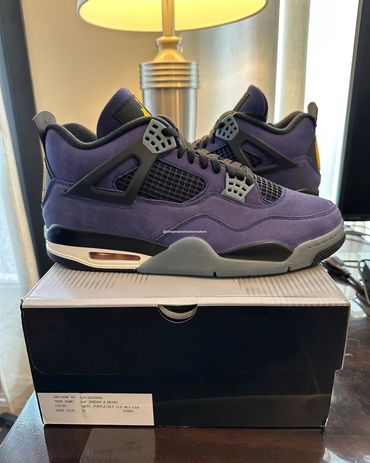 Air Jordan 4 Lakers PE with purple suede upper, golden yellow accents, and custom LA heel branding exclusive to Jordan Brand Classic athletes