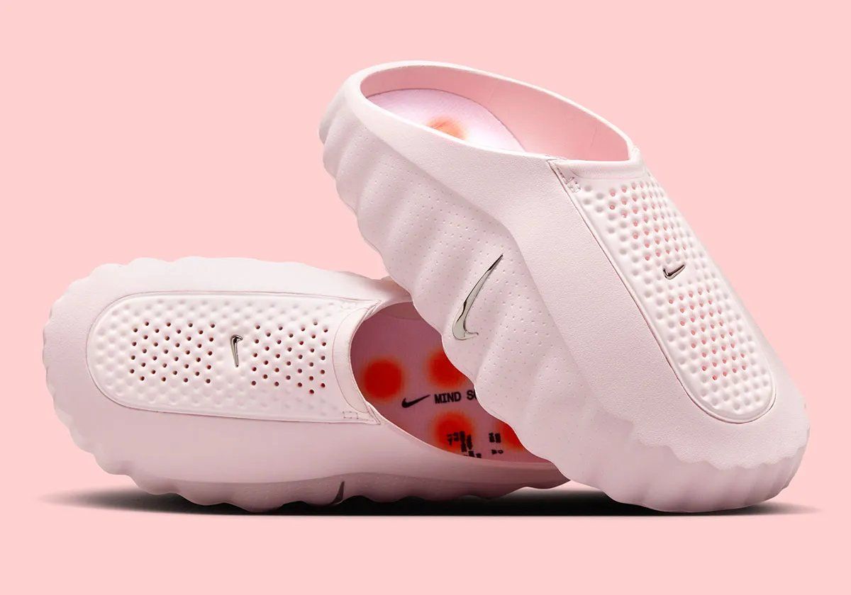 Nike Mind 001 in Pearl Pink, a soft iridescent slide with molded footbed and refined strap design