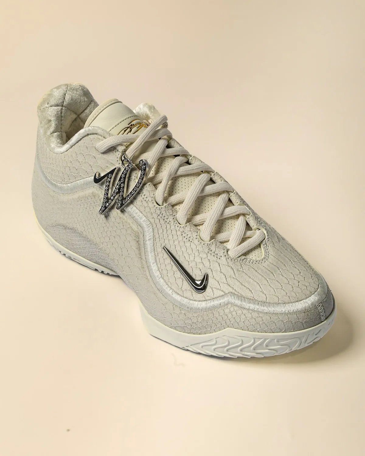 Nike LeBron 23 'White Label' in off-white leather with reptilian scale detailing and metallic Swoosh, WNBA All-Star 2026 collection