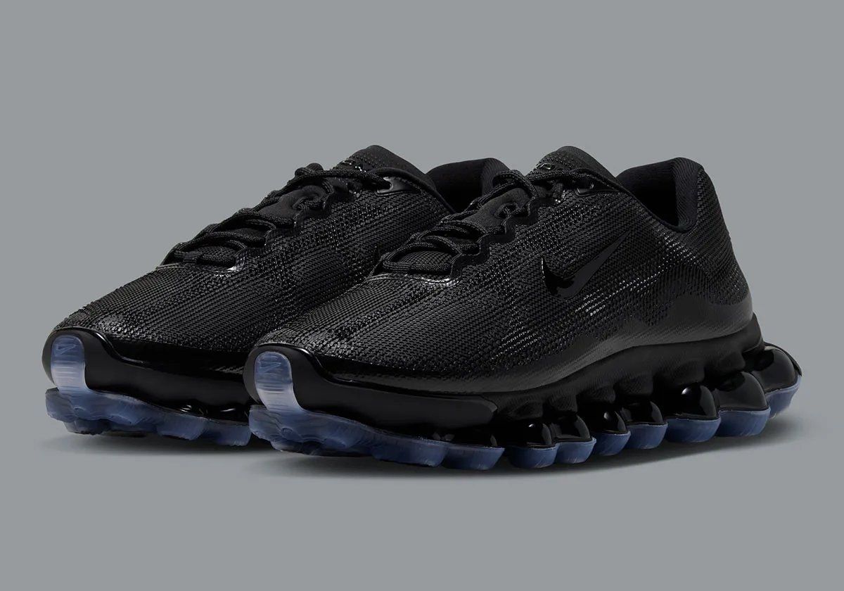 Nike Air Liquid Max in Black/Clear colorway, featuring translucent blue midsole