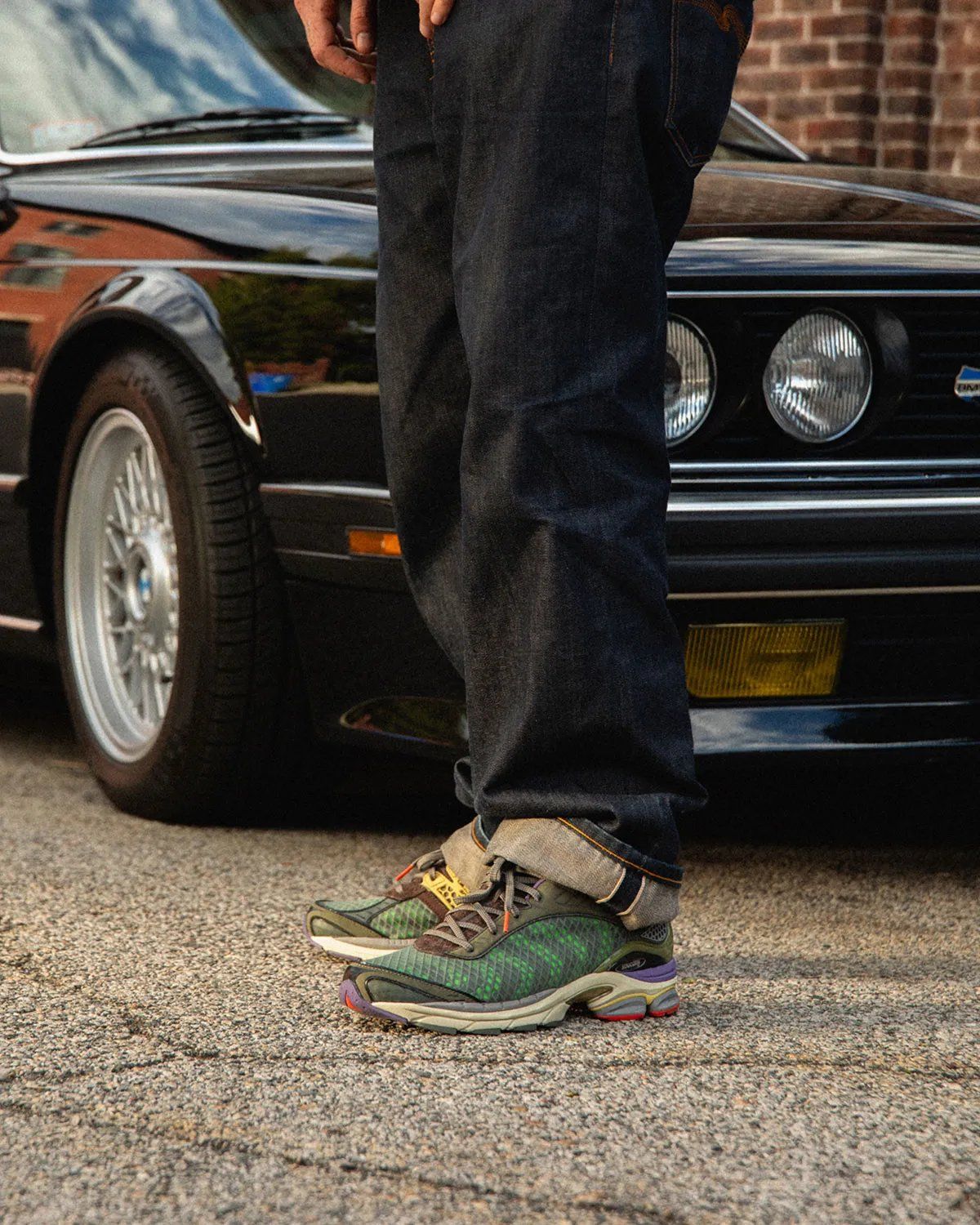 A-Feeling x Saucony ProGrid Paramount in earthy multi-color colorway with vibrant trim and open mesh medial construction