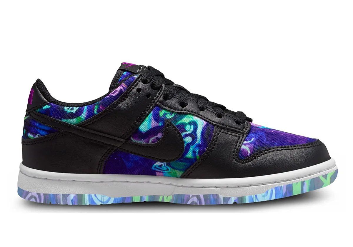 Andrea Bergart x Nike Dunk Low Grade School featuring psychedelic kaleidoscopic prints and metallic charms on upper and sole