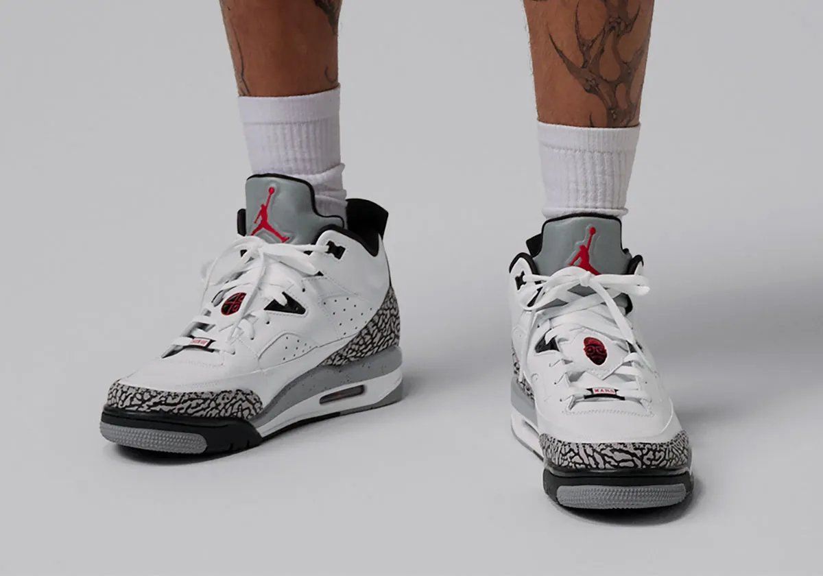Jordan Son of Mars Low in White Cement colorway, showcasing white canvas upper with grey cement paneling and tonal midsole