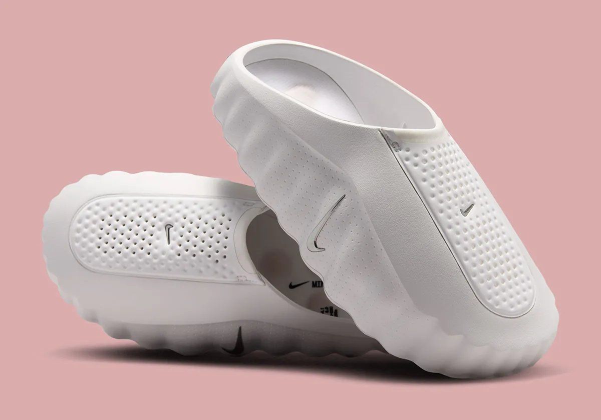 Nike Mind 001 recovery slide in Summit White with Metallic Silver Swoosh and light tan midsole, women's exclusive colorway