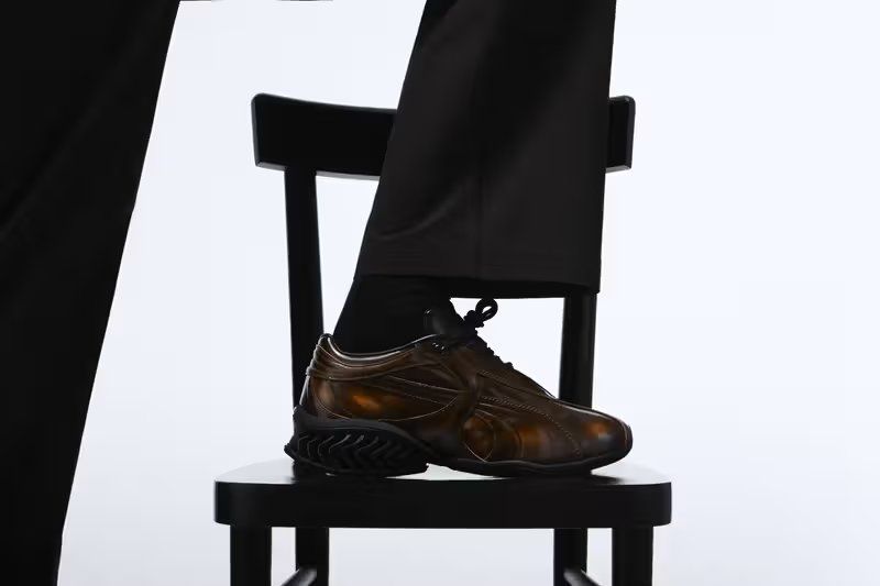 PUMA Cell Geo 1 x _J.L-A.L_ pack in Umbré brown and Midnight blue-black patent leather colorways