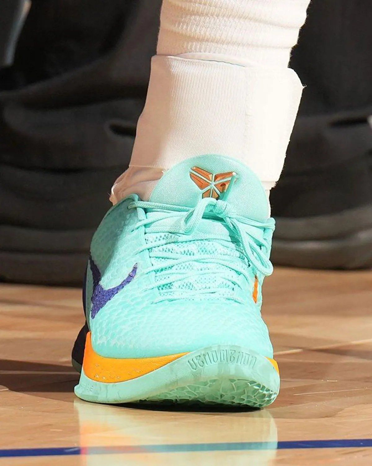 Jalen Brunson wearing custom Nike Kobe 6 with Knicks orange gradient sole at NBA Finals Game 3, Madison Square Garden