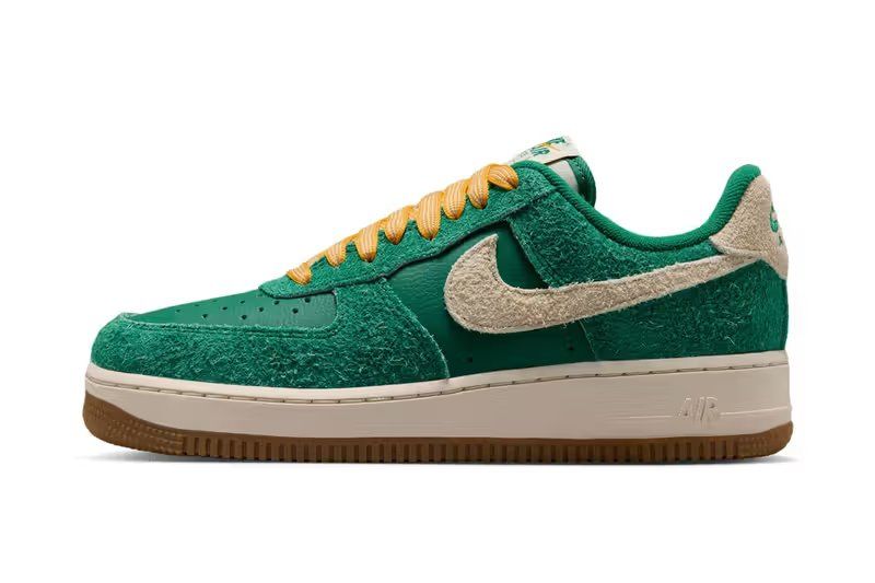 Nike Air Force 1 Low Game Day in Malachite and University Gold colorway, showing side profile and vintage sports-inspired design