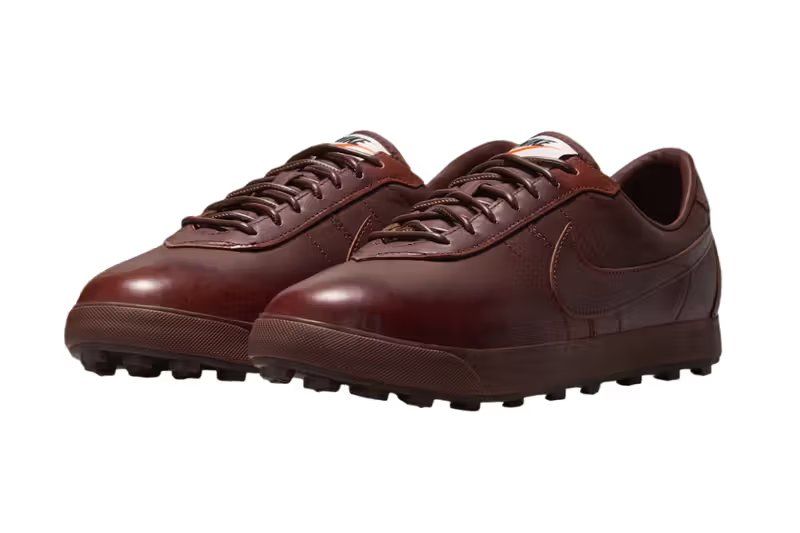 Nike Astrograbber Leather in Black and Barkroot Brown, showcasing premium leather construction and vintage football heritage design