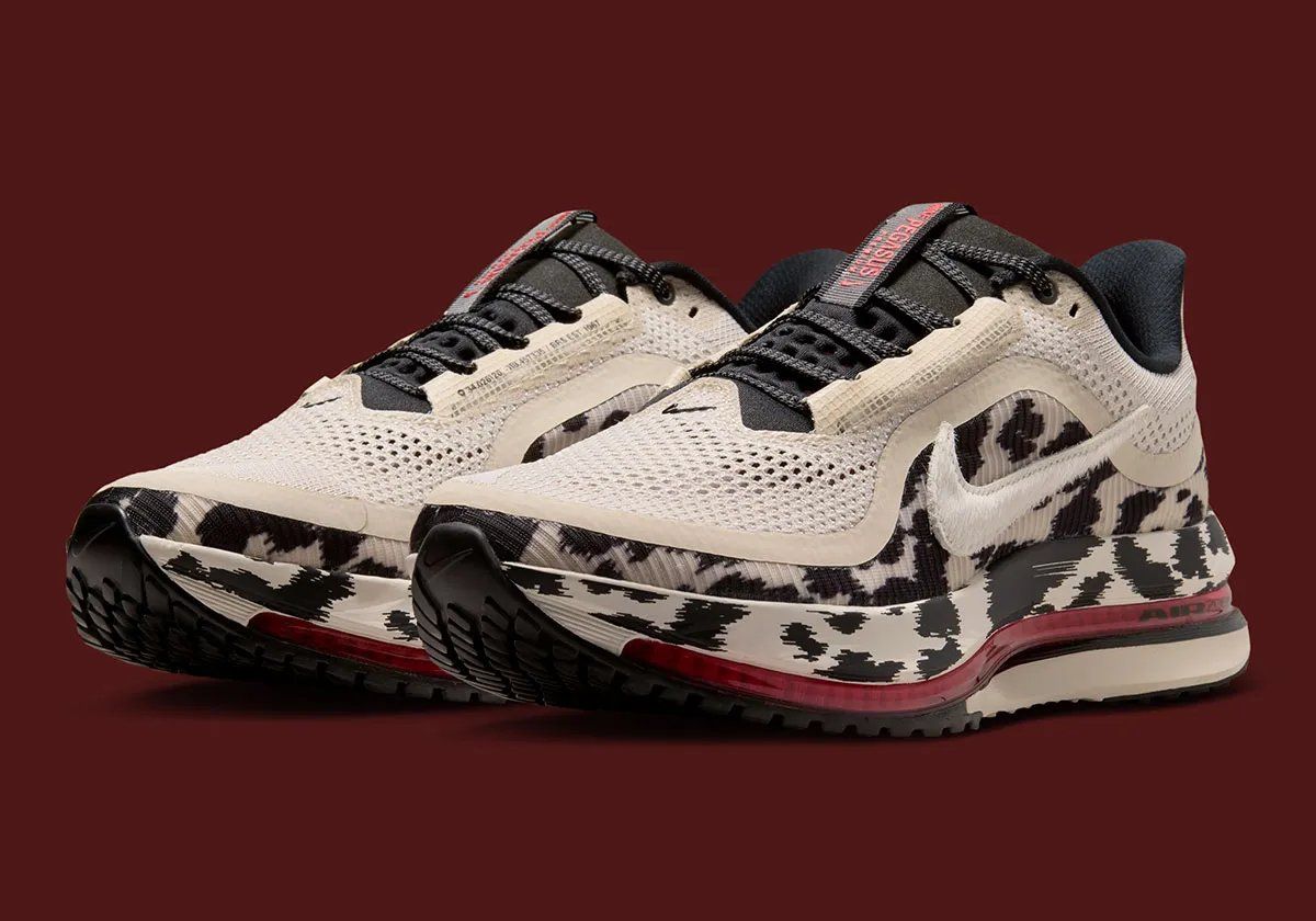 Nike Pegasus Premium in cow print with Sail pony hair Swoosh and University Red Zoom Air unit