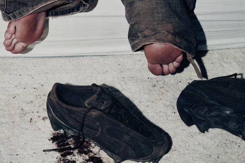 PUMA x No/Faith Studios BEISSER sneaker featuring serrated outsole lugs and layered suede upper, shot in industrial aesthetic by William Arcand