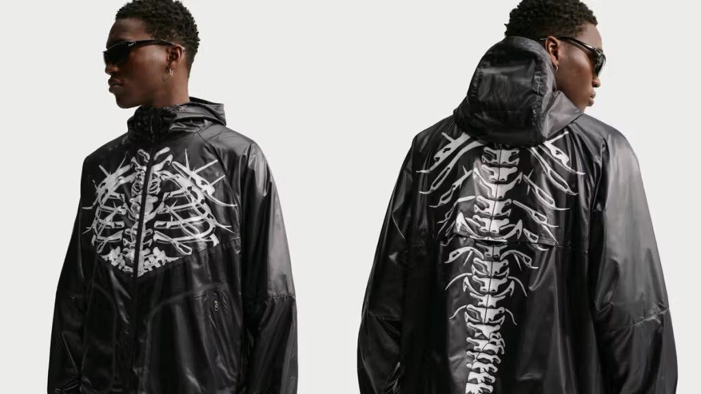 Nike Windrunner jacket in Bones colorway, showing the classic color-blocked nylon shell and lightweight construction