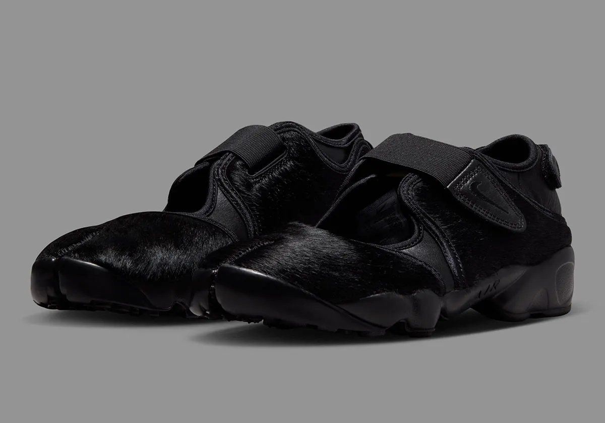 Nike Air Rift Pony Hair Pack in black colorway with tabi toe design and pony hair texture upper