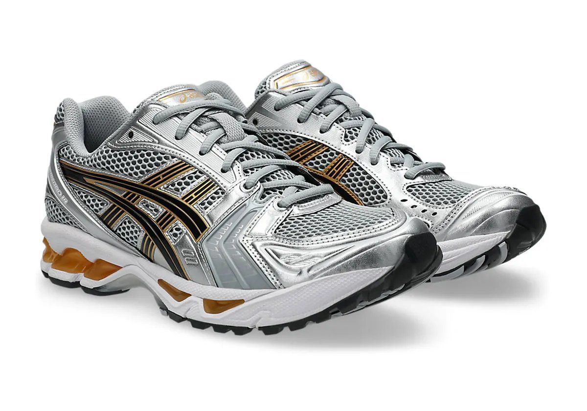 ASICS GEL-Kayano 14 in Silver and Gold colorway with mesh upper and gold GEL pod detailing