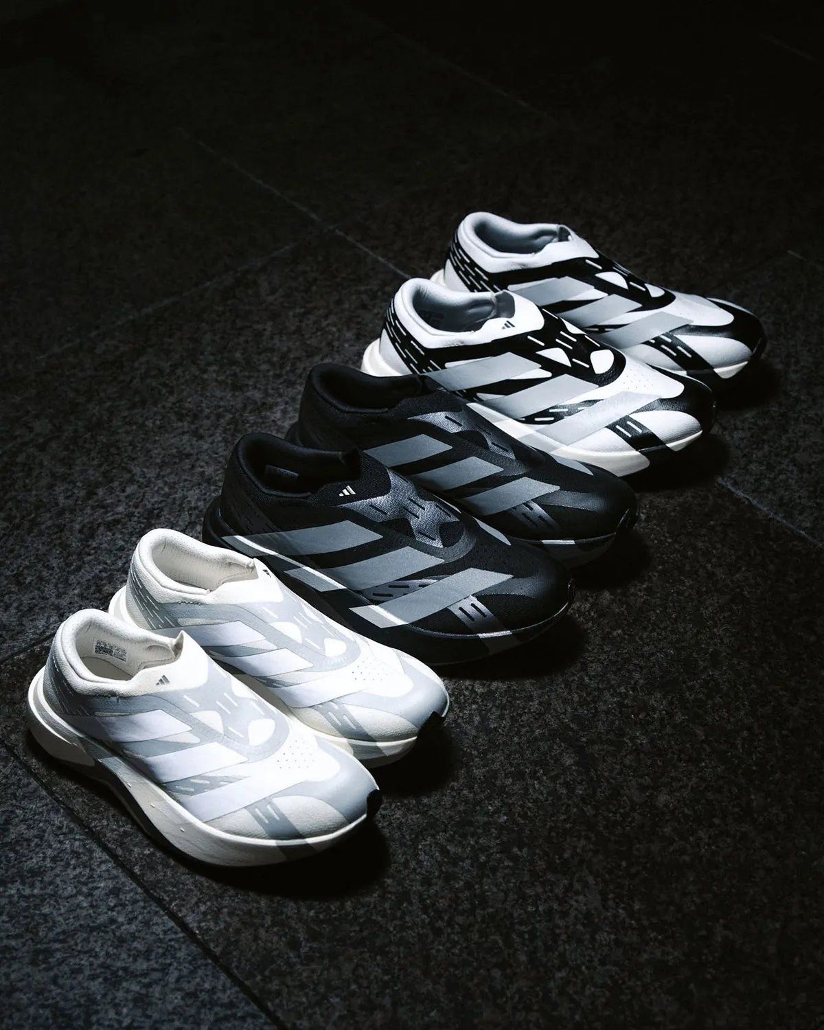 adidas EVO SL Laceless in profile, showing reinforced synthetic layers and minimal sock-collar construction