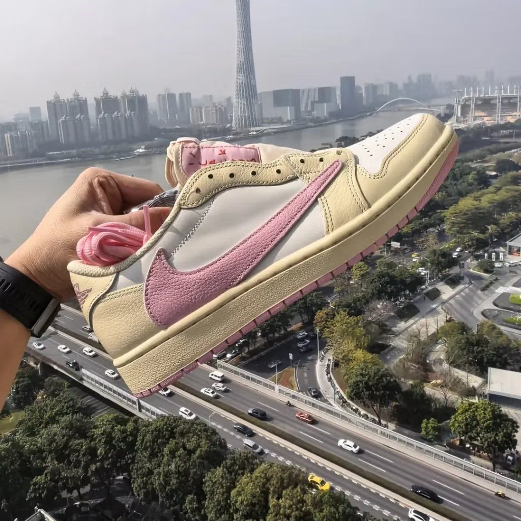 Travis Scott x Air Jordan 1 Low OG Shy Pink lateral and medial side views