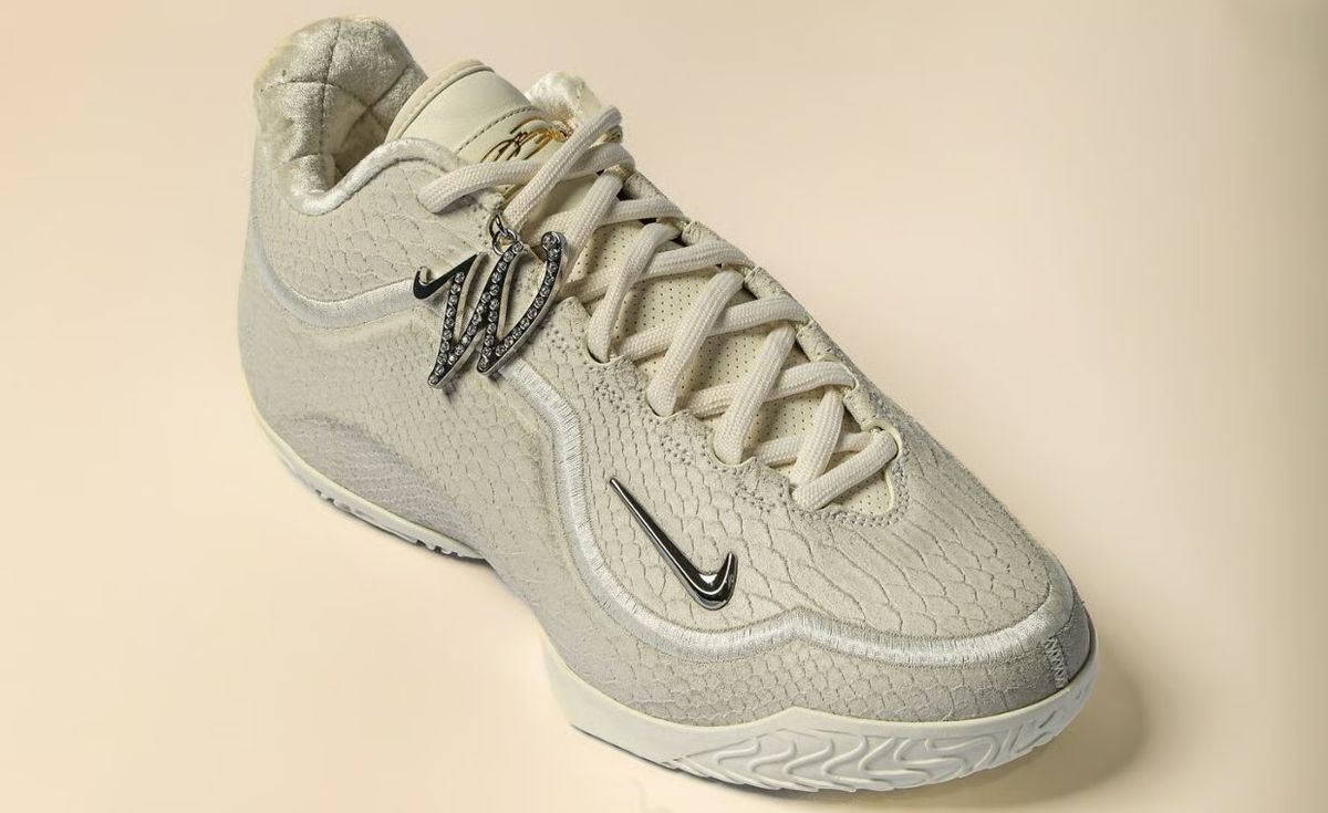 Nike LeBron 23 White Label PE with faux snakeskin upper, cream textile bands, and metallic silver accents