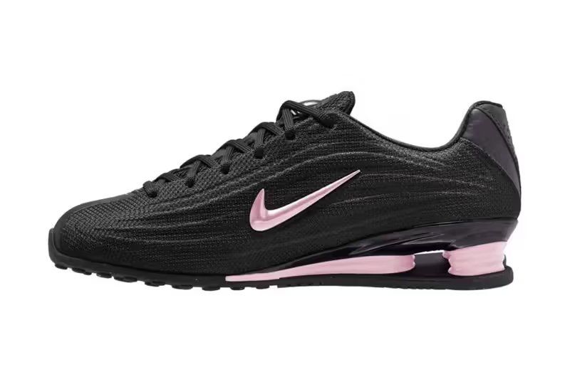 Nike Shox Z in Black/Pink Foam colorway, showing textile upper with pearlescent pink accents