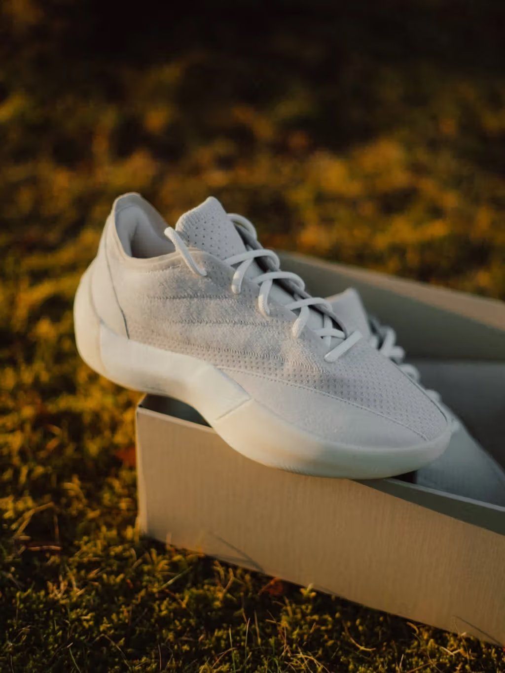 Fear of God Athletics Basketball III in neutral colorway, showcasing Jerry Lorenzo's minimalist design for Adidas