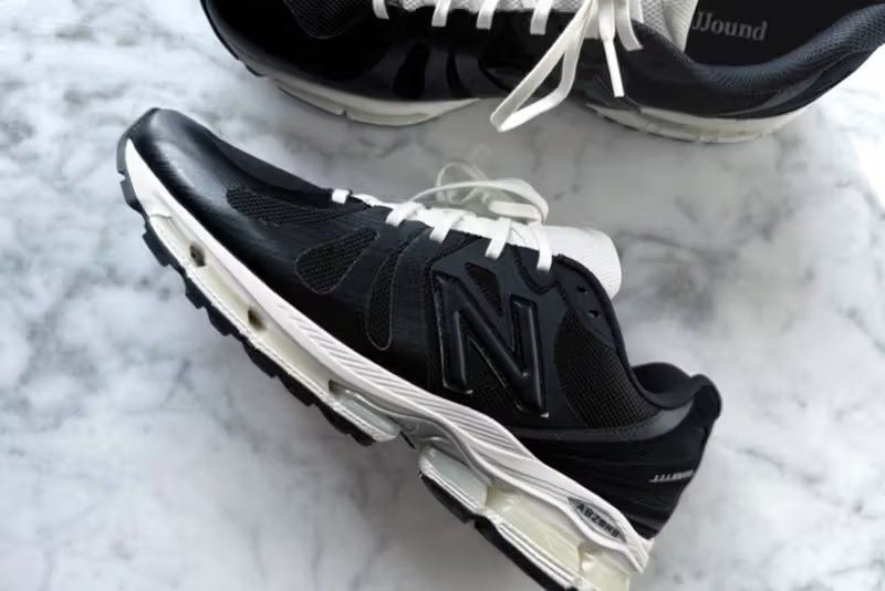 JJJJound x New Balance 1890 in black mesh with white satin taping, tuxedo-inspired aesthetic