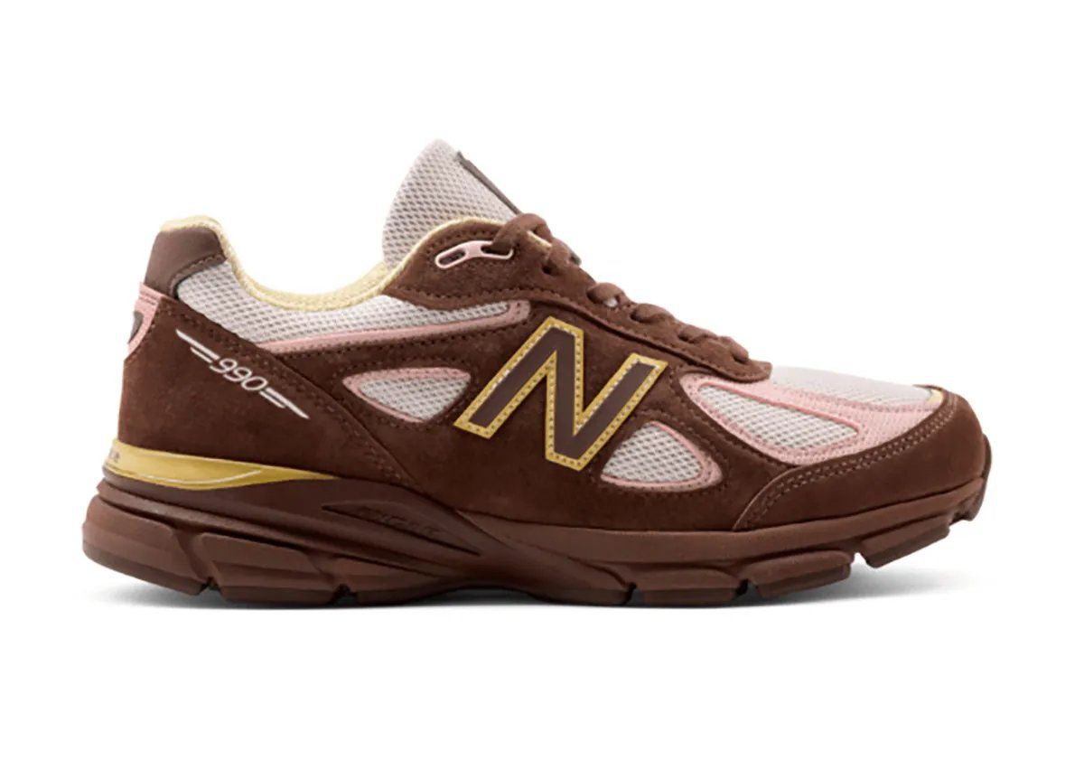 New Balance 990v4 Pumpernickel colorway featuring brown suede upper with pink mesh and yellow N logo trim