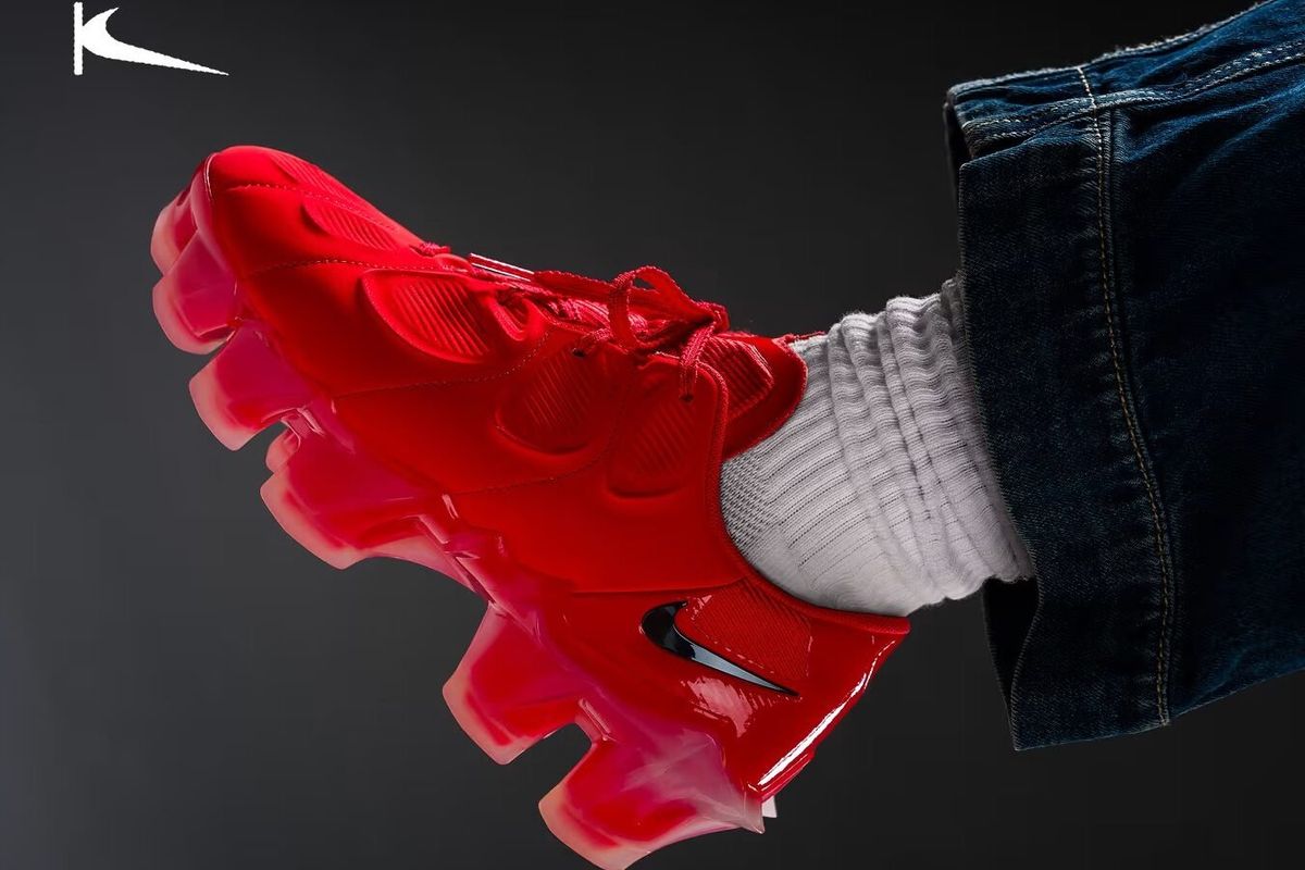 Nike First Sight Mirage WMNS in Light Crimson colorway featuring cleat-inspired outsole and translucent detailing