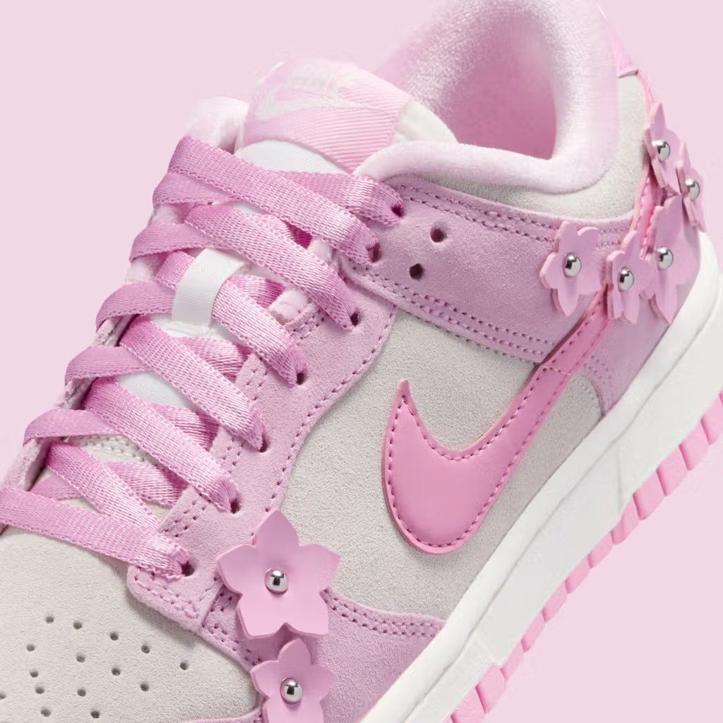 Nike Dunk Low Women's Pink Flowers colorway showing floral-inspired pink and neutral tones on the classic low-cut basketball silhouette