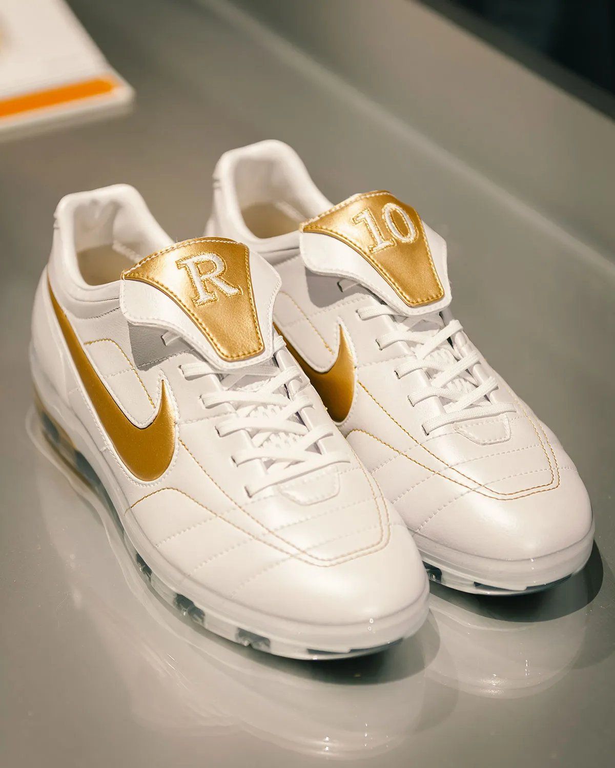 Nike Cryoshot Tiempo Legend in Touch of Gold colorway with gilded accents and quilted upper