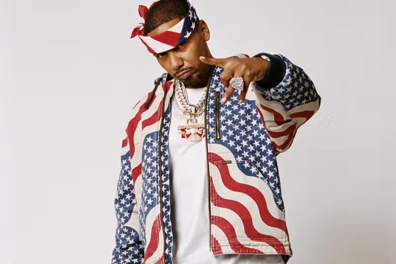 Juelz Santana in Supreme campaign shot by Ari Marcopoulos, styled with American flag motifs referencing Final Destination album artwork